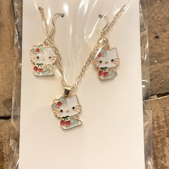 Hello kitty necklace earrings